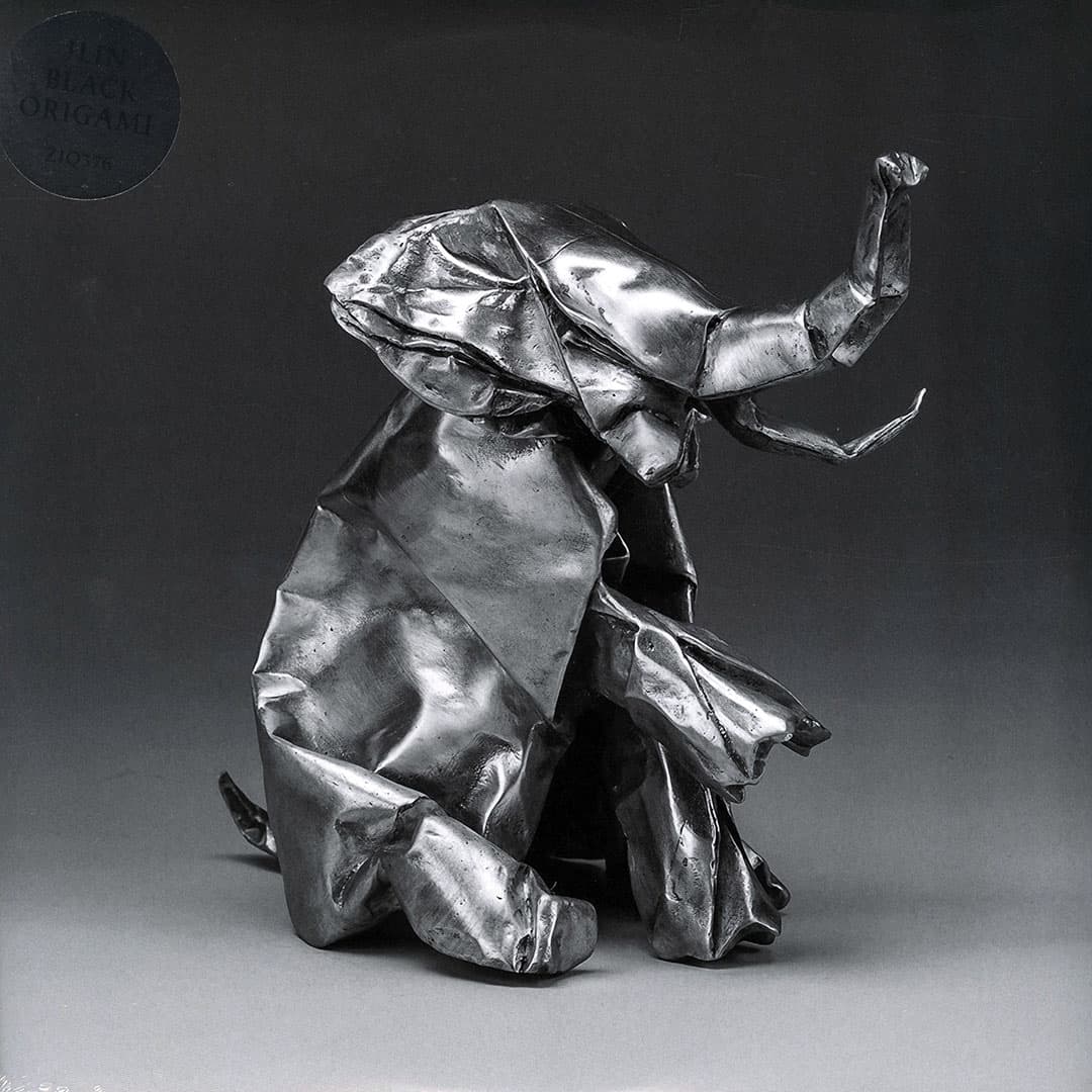 Jlin - Black Origami - 12